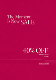 Text: The Moment Is Now Sale. 40% Off* Selected Styles. T&Cs Apply