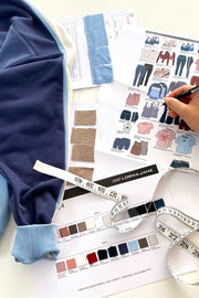 Photo of Lorna Jane activewear designs, including a blue sweater