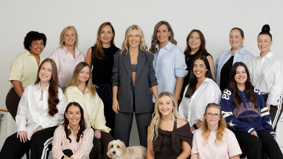Lorna Jane Clarkson with various employees