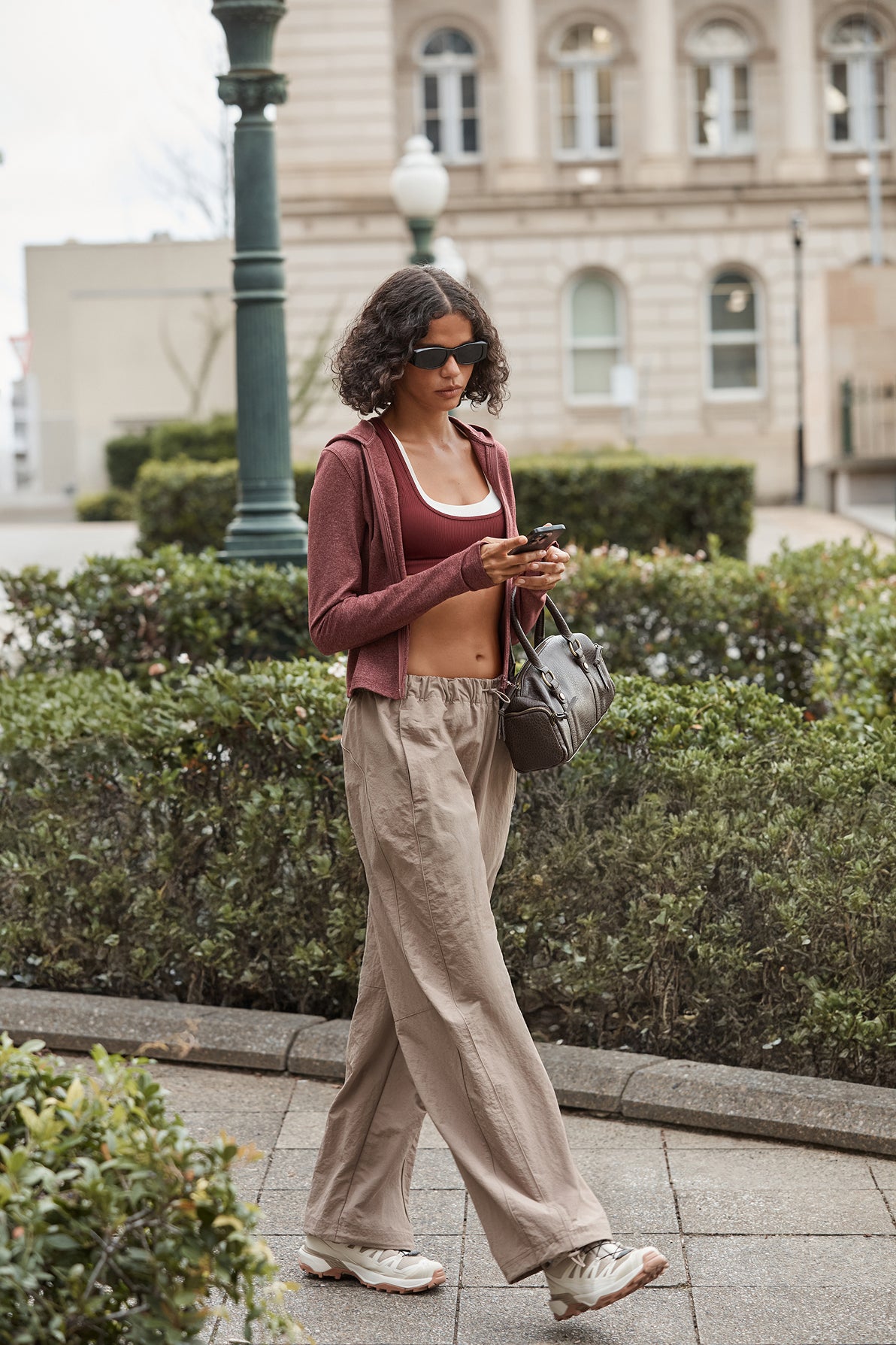 Woman wearing Lorna Jane walking around town