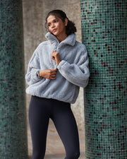 Woman wearing Lorna Jane sweater