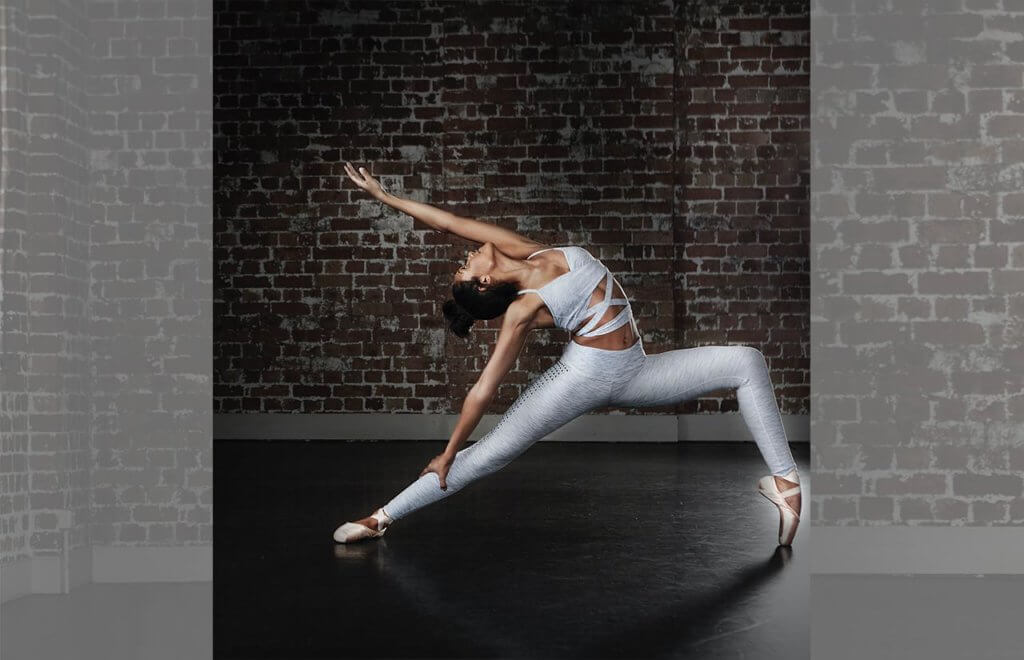woman doing ballet in pale leggings and matching sports bra