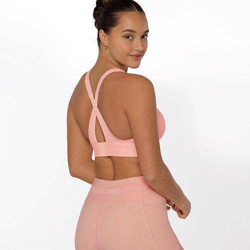 woman wearing ultra hold pink maximum impact sports bra