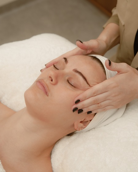 woman getting skin treatment done at browskii day spa
