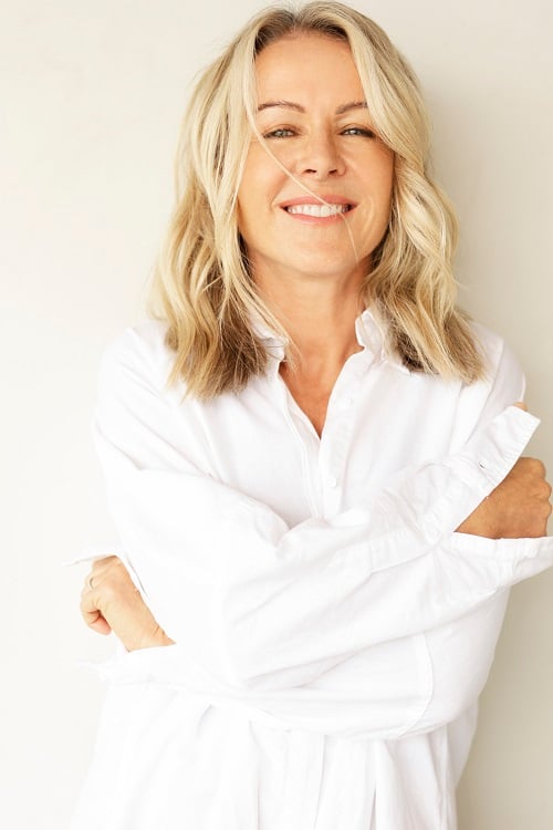 colour image of Lorna Jane Clarkson smiling in a white t-shirt